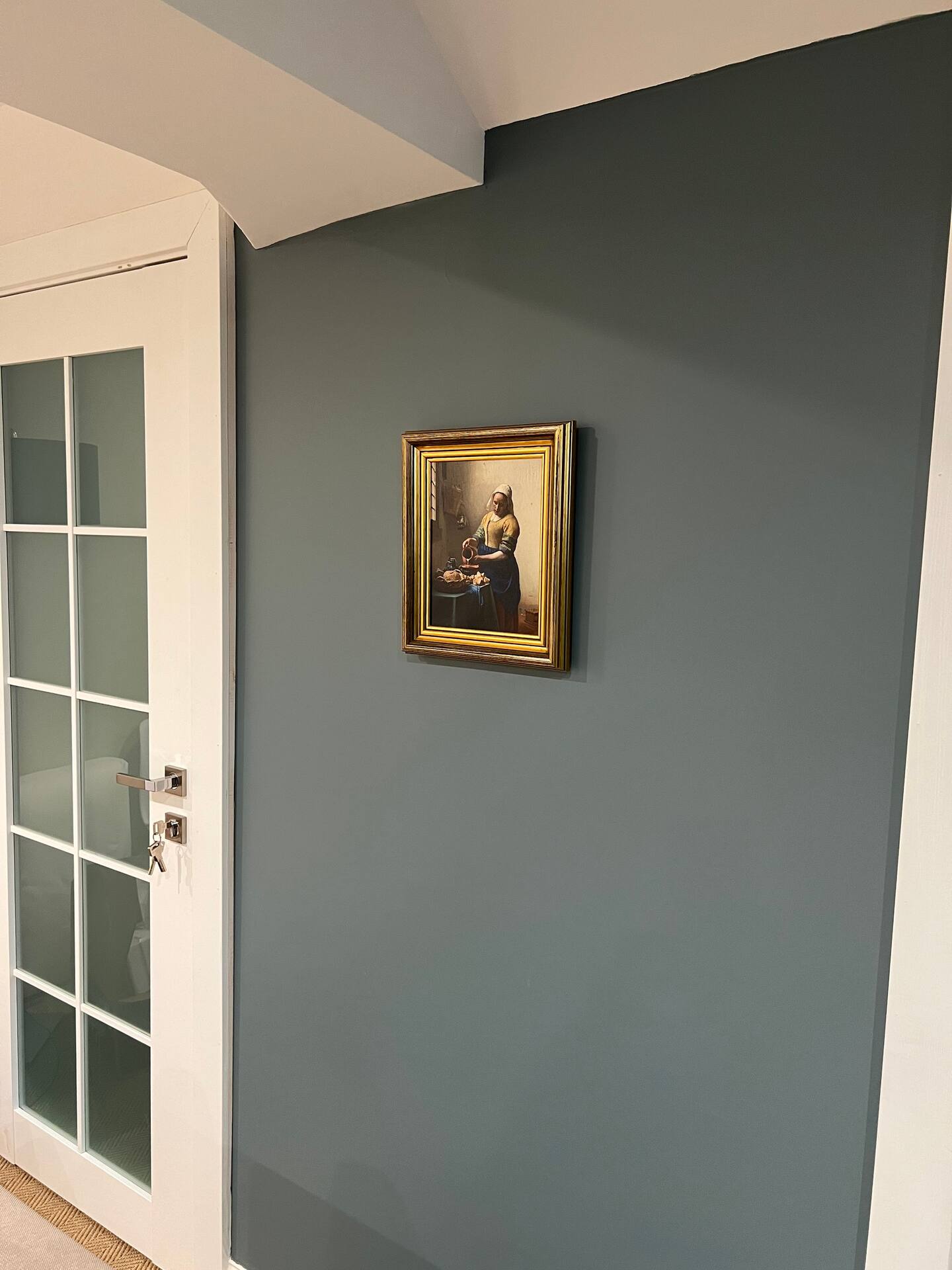 Living room with Vermeer painting