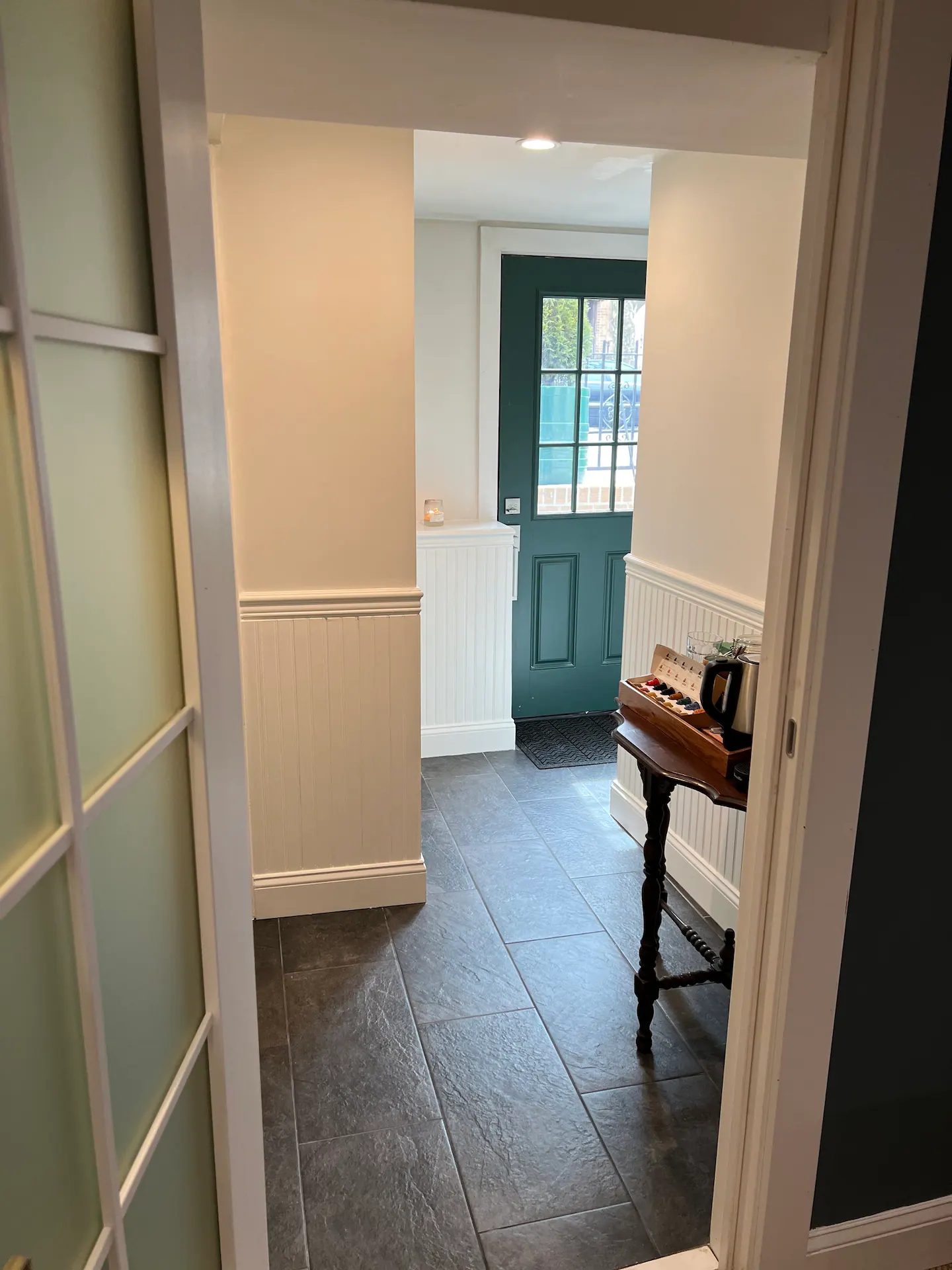 Entrance hall with teal door